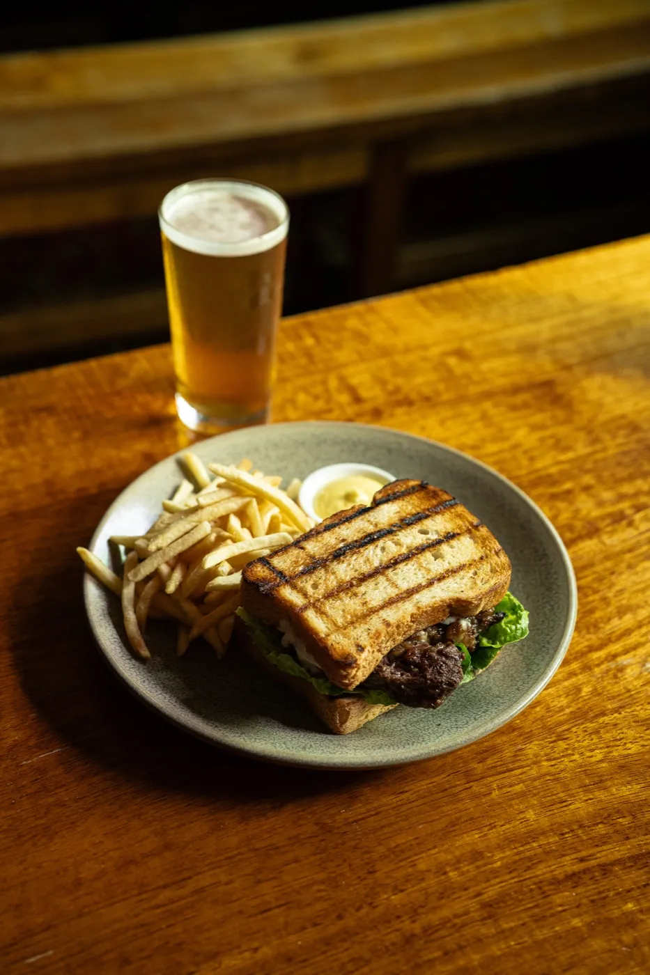 Steak sandwich with chips, served at the Napier